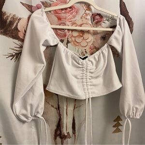 Size 8 off the shoulder cropped pretty little thing top​​​​